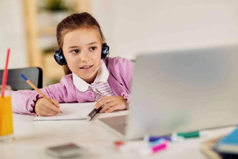 Girl at online programming classes for kids